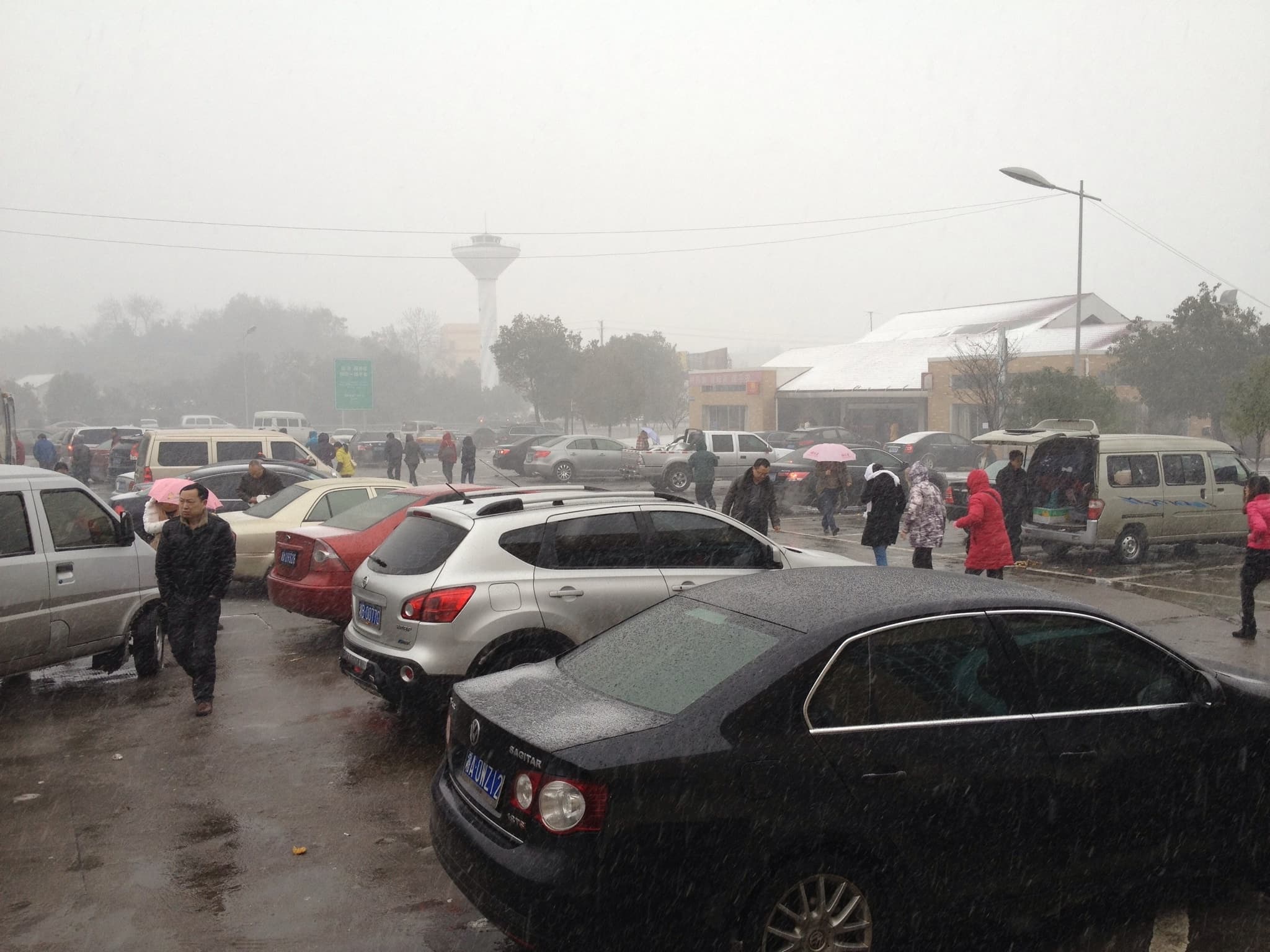 a car partially on ice