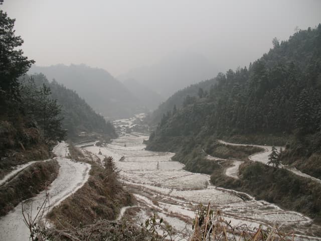 Snowy river flowing through mountains