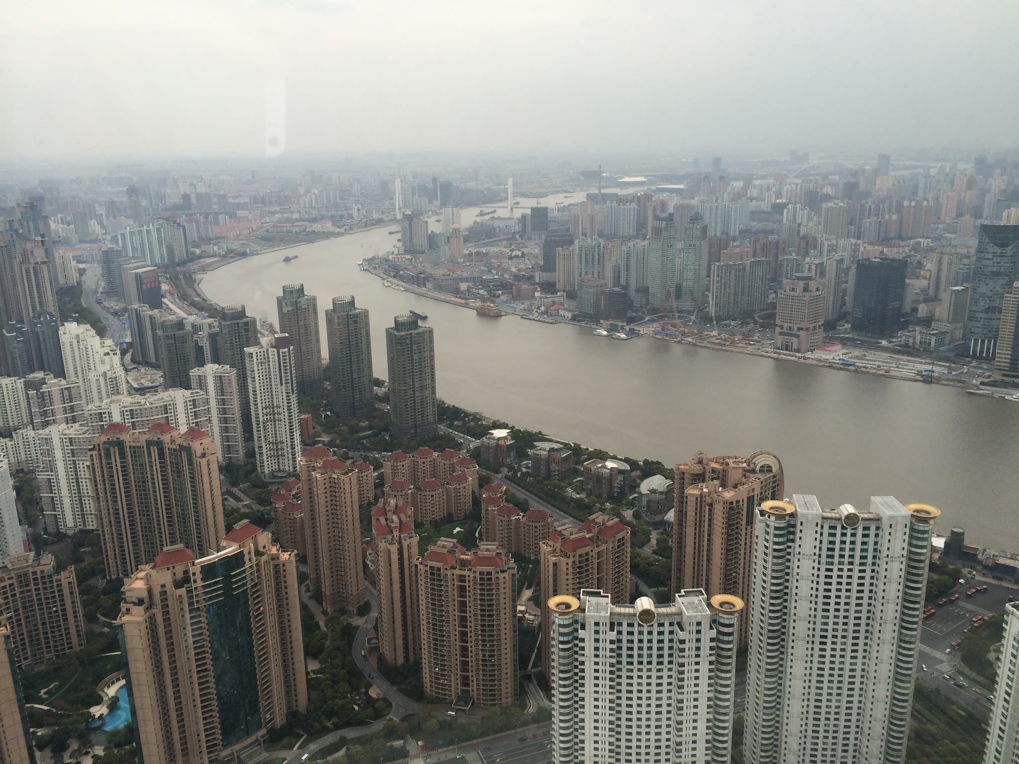The Oriental Pearl Tower in Shanghai with fog rolling in
