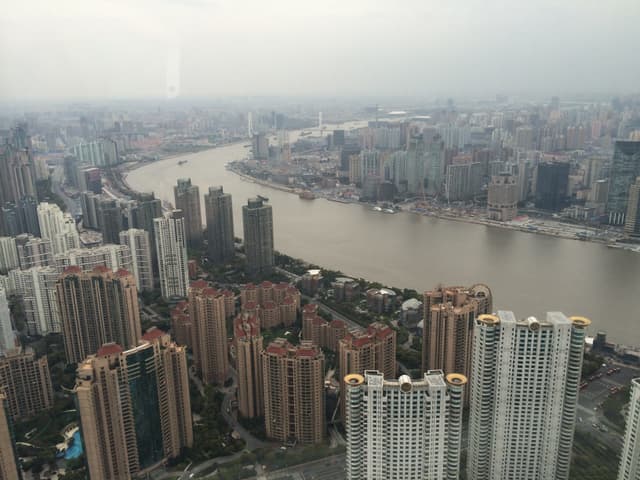 The Oriental Pearl Tower in Shanghai with fog rolling in